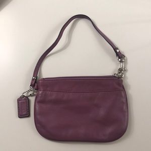 Purple coach wristlet 👜